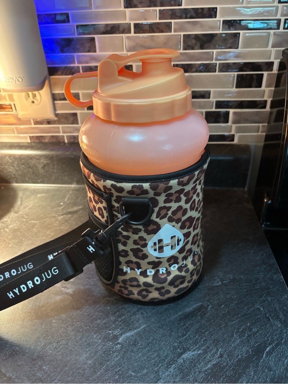 Peach hydrojug with leopard carrier